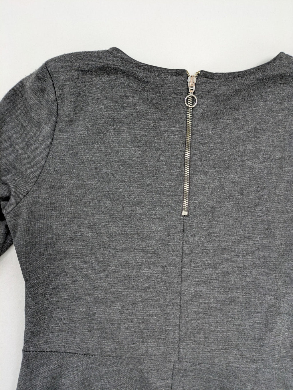 Ginatricot grey A-line skater dress with 3/4 sleeves and visible back zipper.