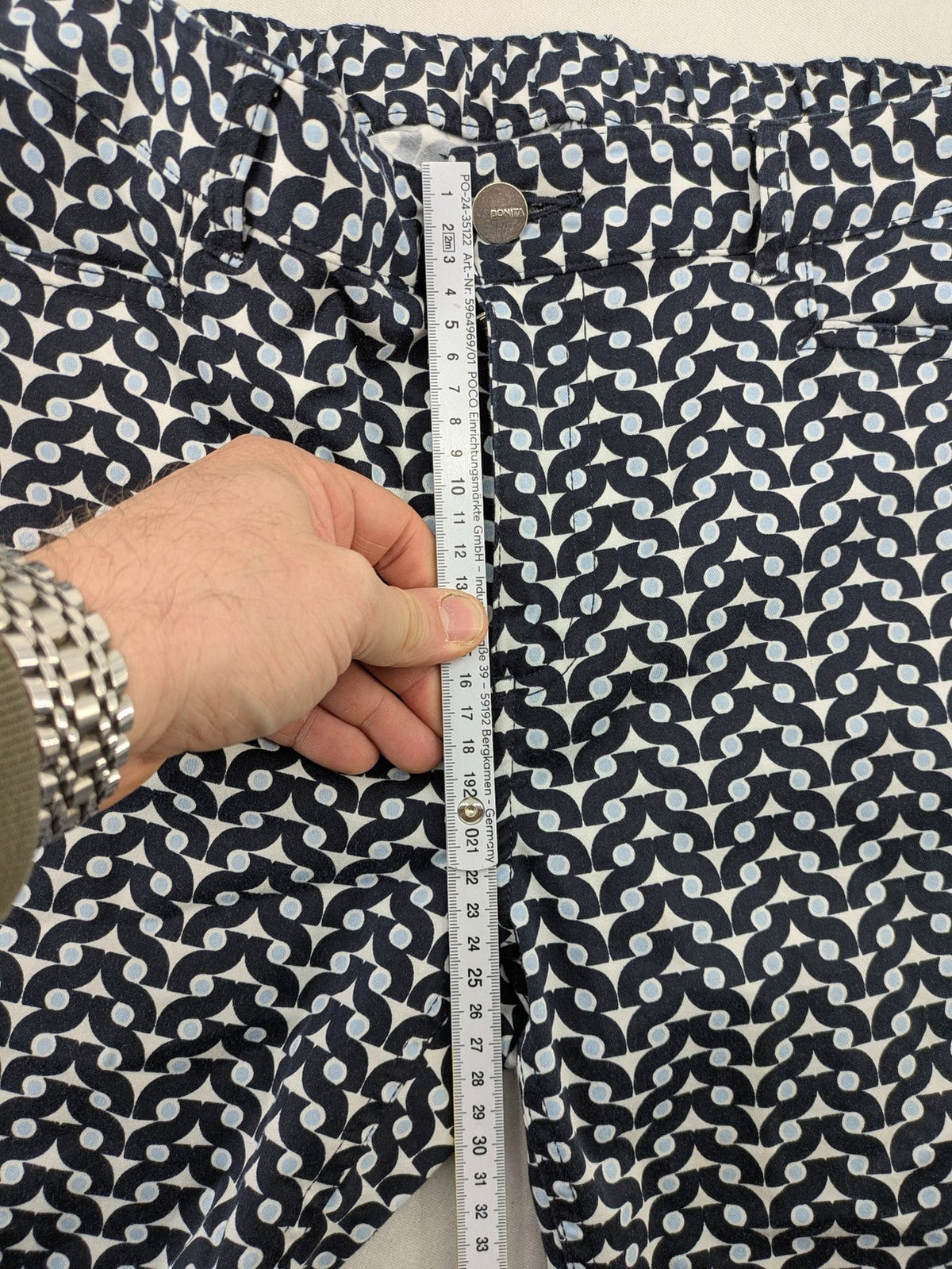Bonita navy pants with geometric pattern, stretch material, and classic zip fly closure.