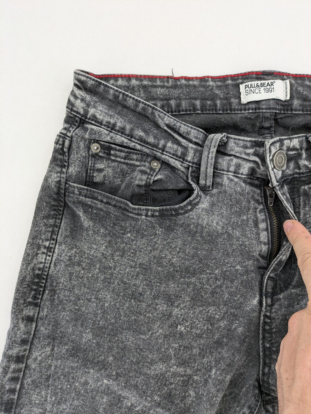 Pull&Bear black acid wash straight jeans slim fit with faded denim texture.