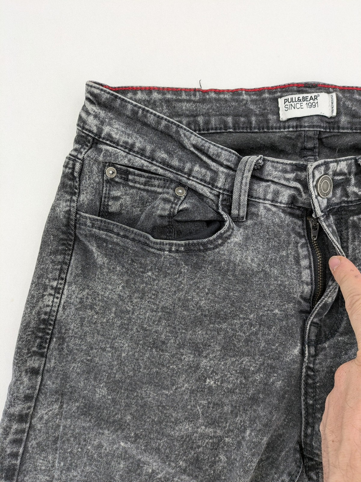 Pull&Bear black acid wash straight jeans slim fit with faded denim texture.