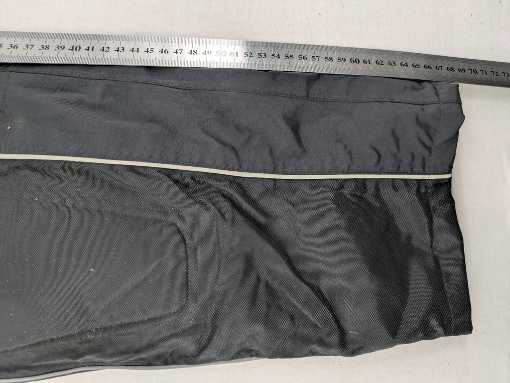 Polo black chaps with grey and white accents, featuring protective knee pads and adjustable belt.