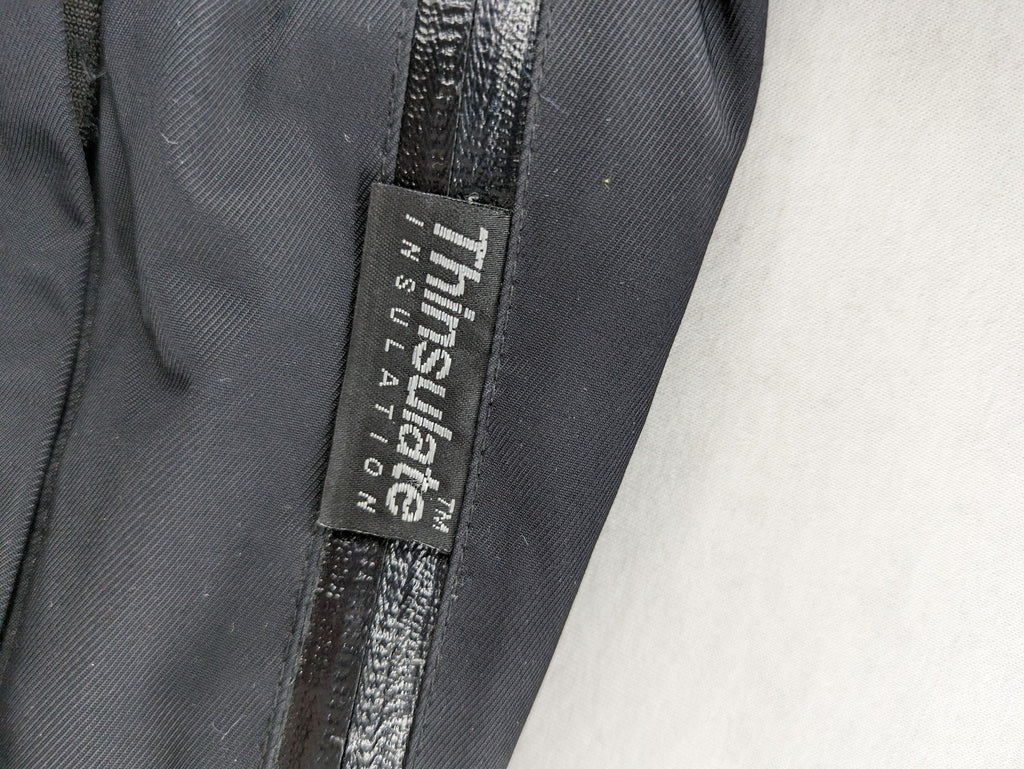 COOLE black ski pants with Thinsulate insulation and versatile unisex design.