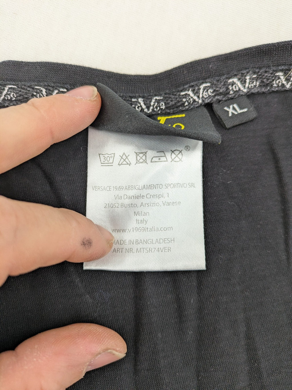 Versace 19.69 black short sleeve t-shirt with graphic logo print and V-neck design.