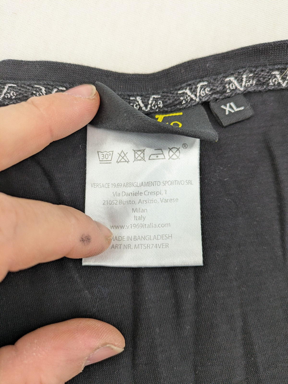 Versace 19.69 black short sleeve t-shirt with graphic logo print and V-neck design.