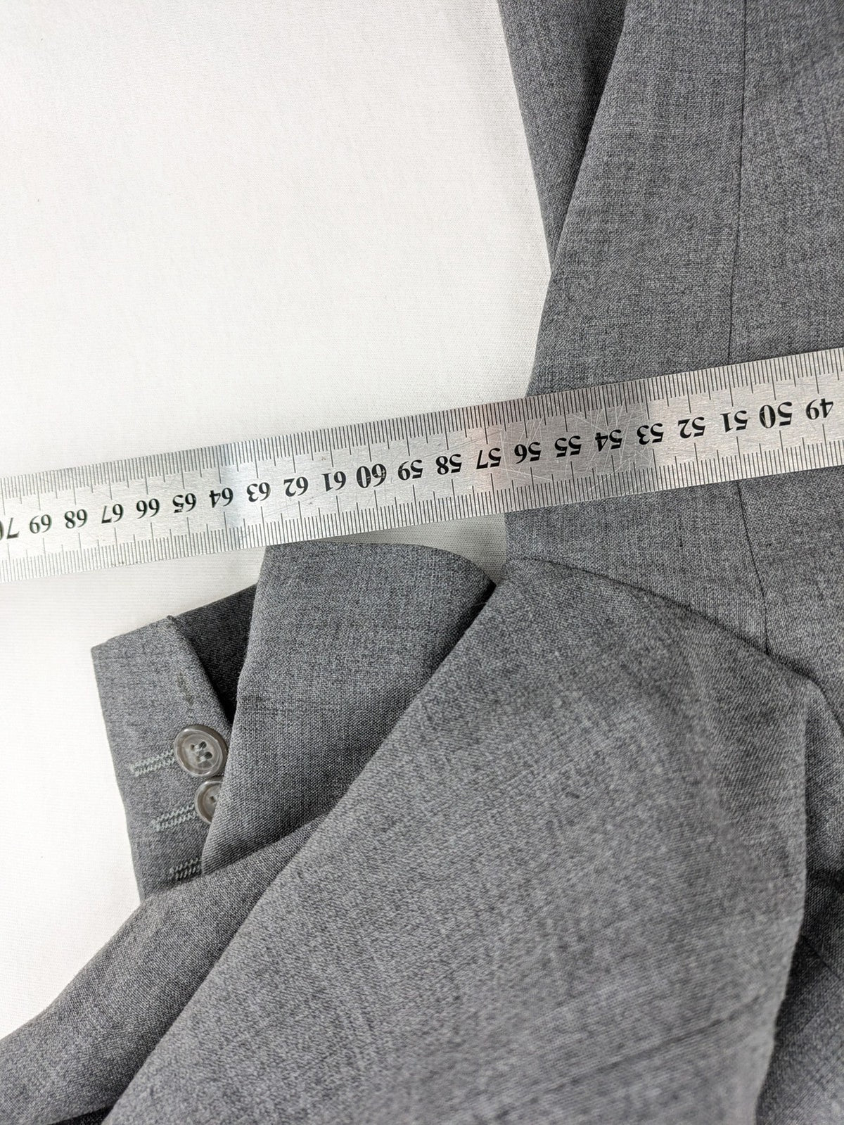 Montego grey blazer three-button design made from wool blend with smooth lining.