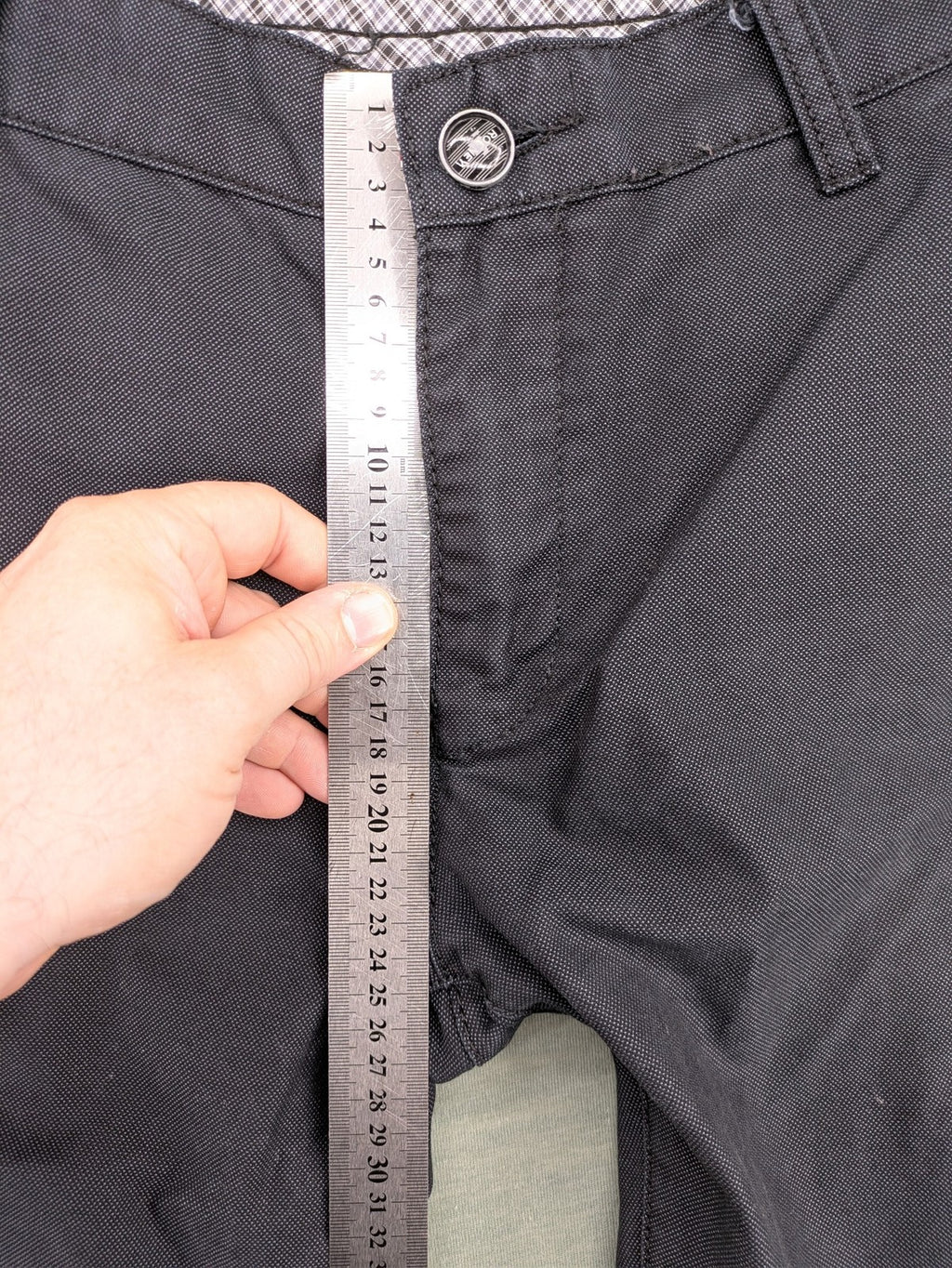 Rooney grey chino pants with checkered waistband and buttoned back pockets.