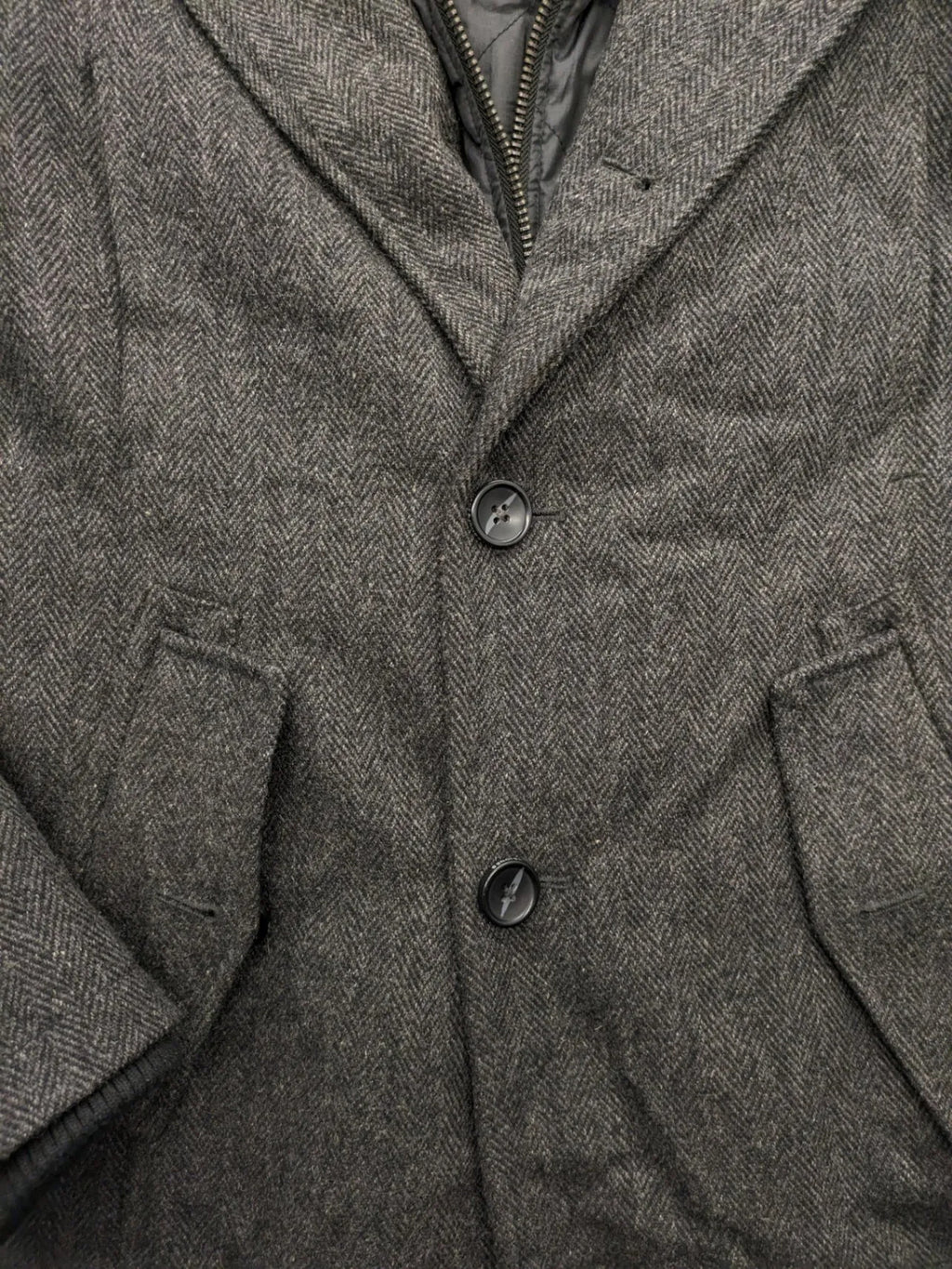 Jack & Jones grey coat herringbone pattern with two-button closure and side pockets.