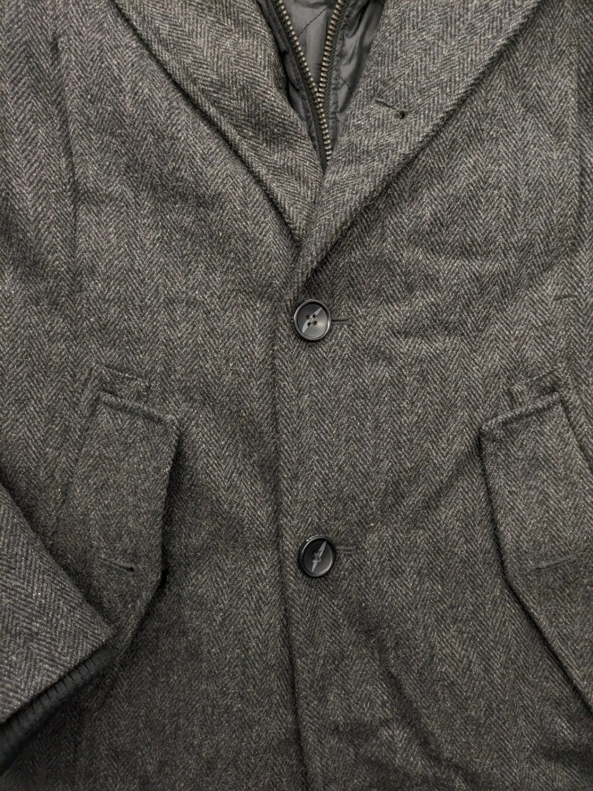 Jack & Jones grey coat herringbone pattern with two-button closure and side pockets.