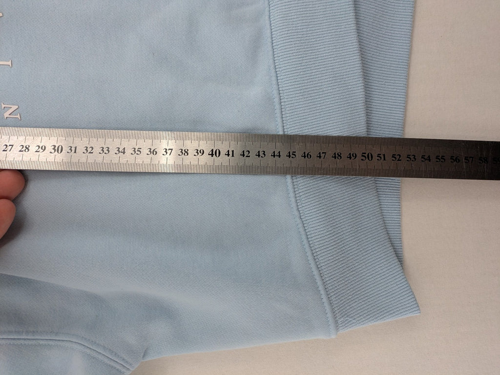 Columbia University blue hoodie with large "Columbia University" text on chest.
