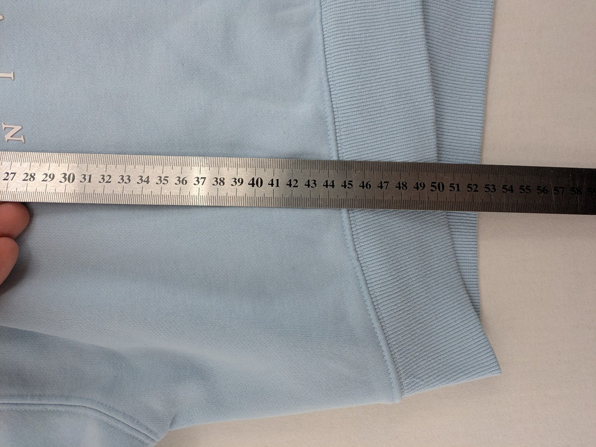 Columbia University blue hoodie with large "Columbia University" text on chest.