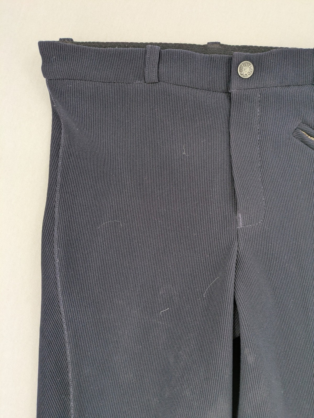 Cavalliero blue youth riding pants with knee patches and ribbed microfiber fabric.