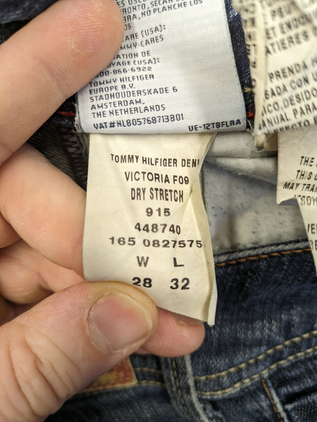 Tommy Hilfiger Denim blue straight jeans with low rise and slight used effects.
