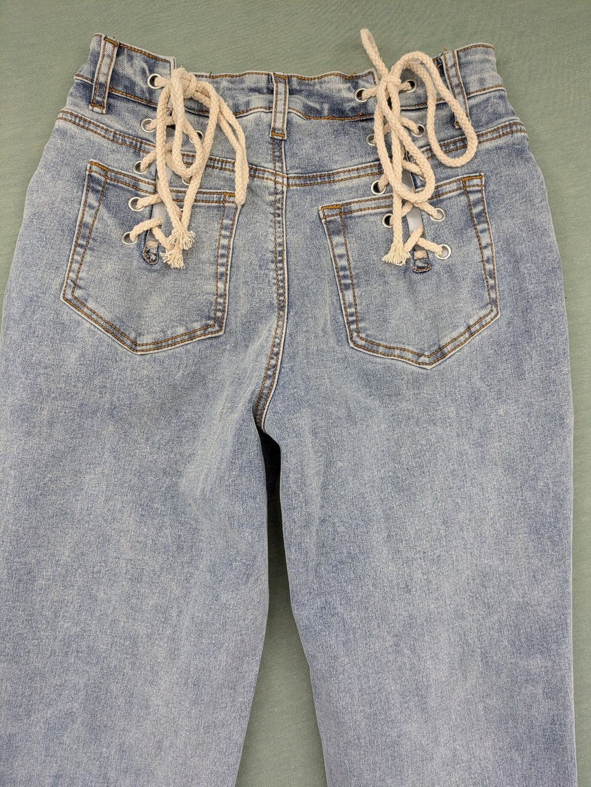 SHEIN blue straight jeans high waist with unique lacing details and stylish design.