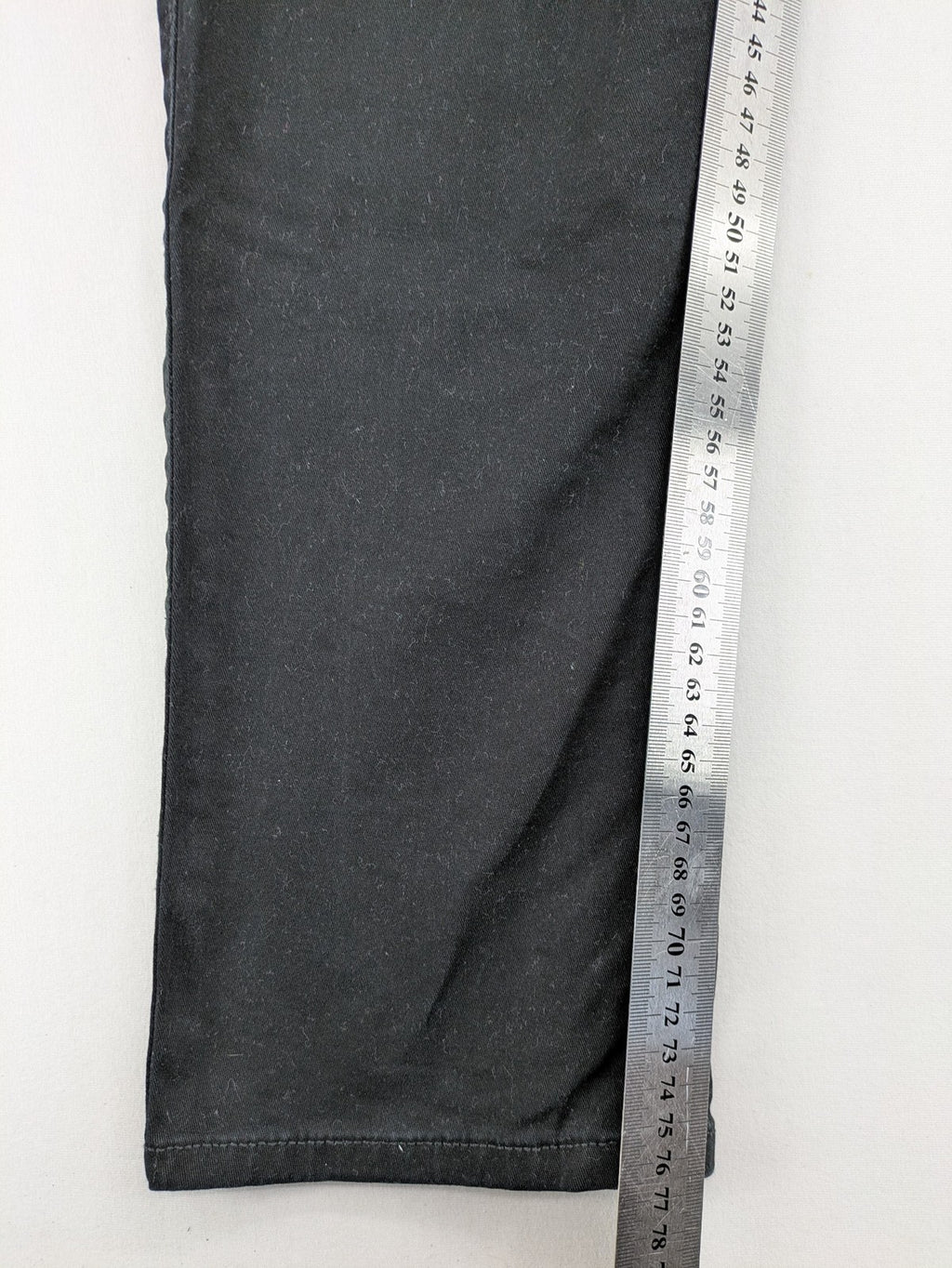 Jack & Jones black slim fit jeans with logo patch and cotton-stretch blend.