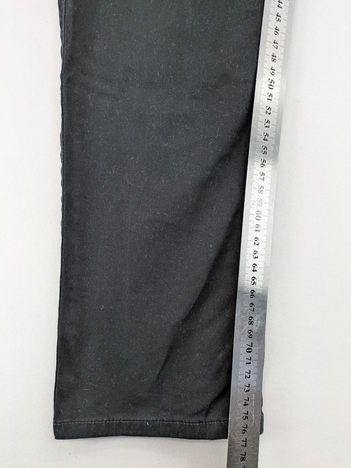 Jack & Jones black slim fit jeans with logo patch and cotton-stretch blend.