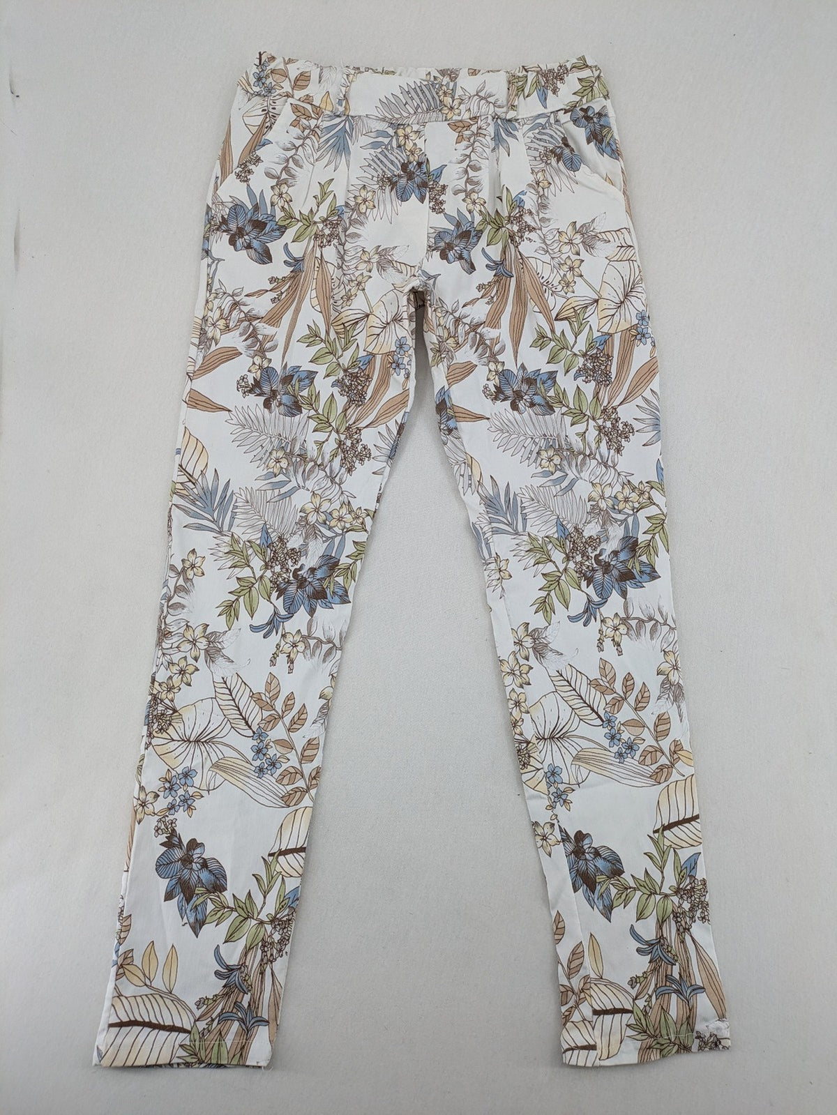 Made in Italy multi pants tropical floral pattern cotton-viscose blend on white background.