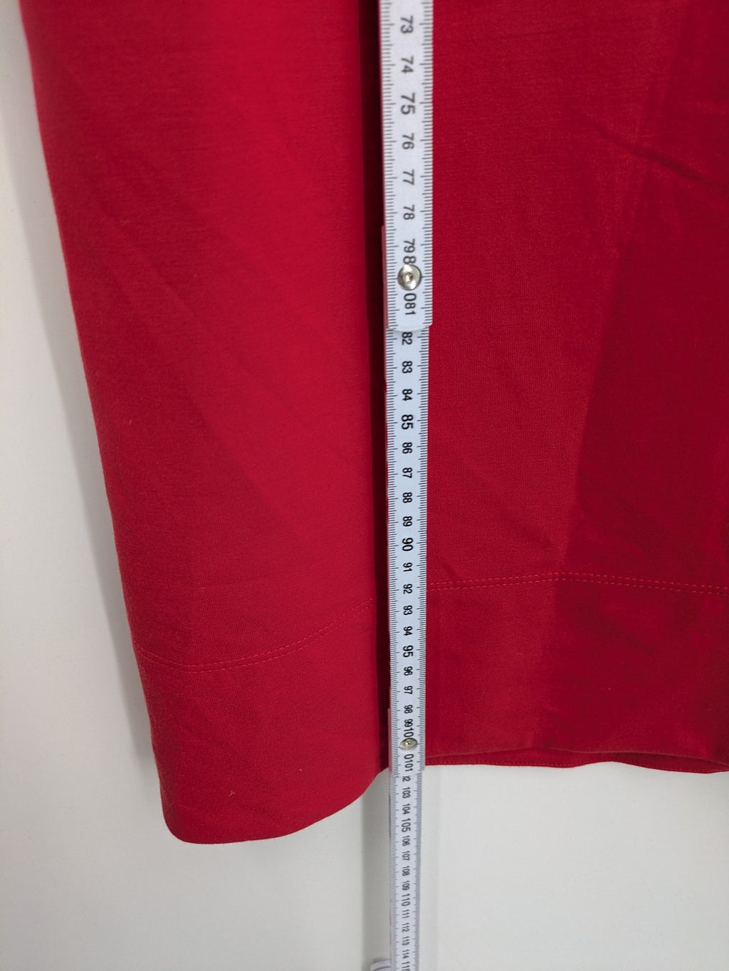 H&M red A-line dress with stand collar, 3/4 sleeves, and side pockets in stretchy jersey.