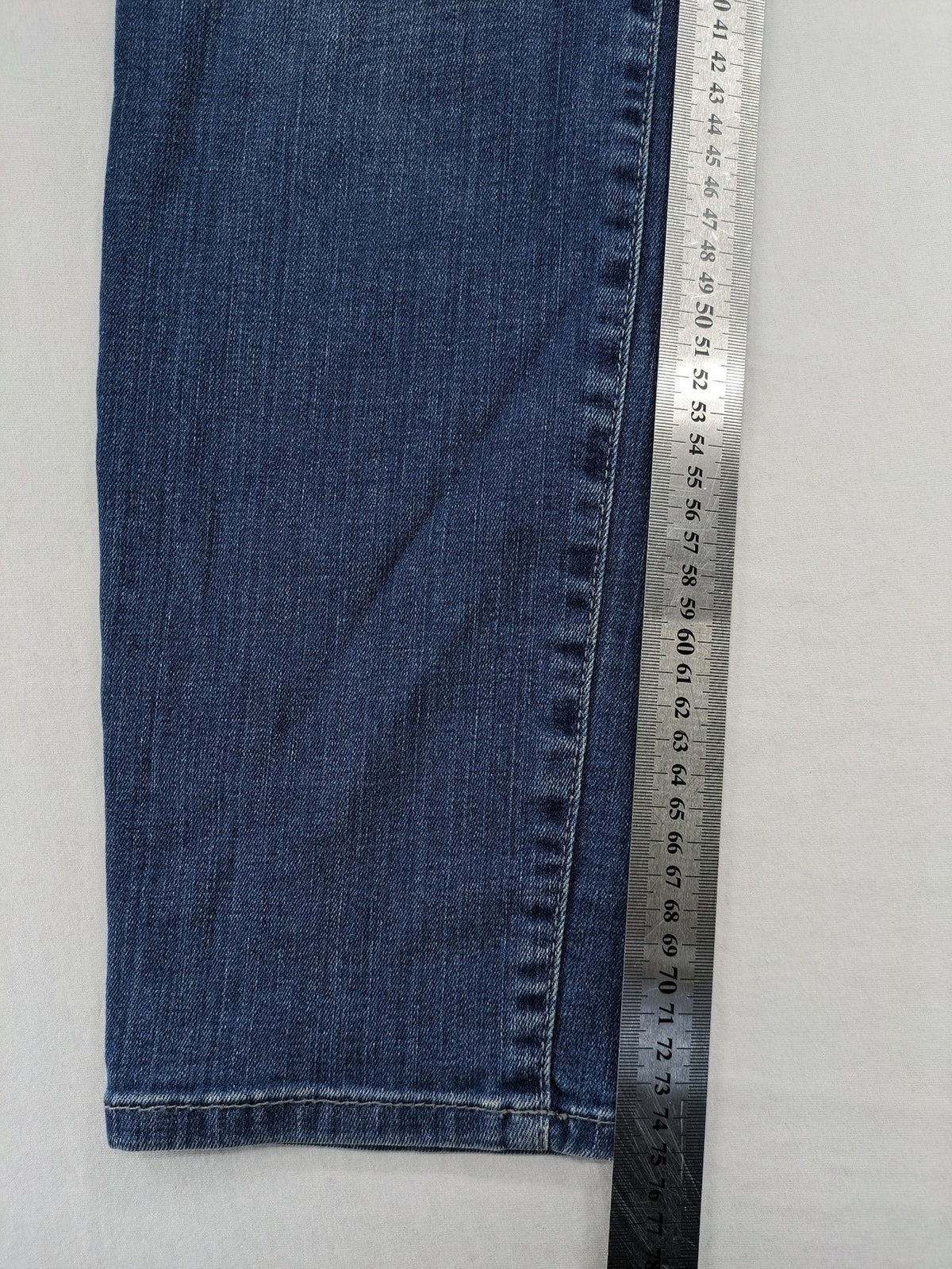 Gerry Weber blue straight jeans with decorative rhinestone appliqués and stretch denim material.