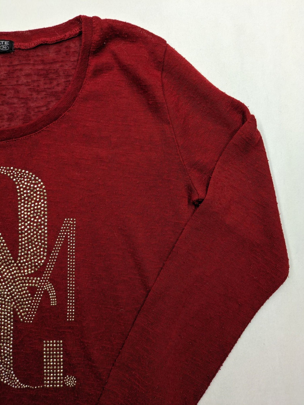 BLIND DATE cream red long sleeve top with sparkling OMG rhinestone design and classic round neckline.