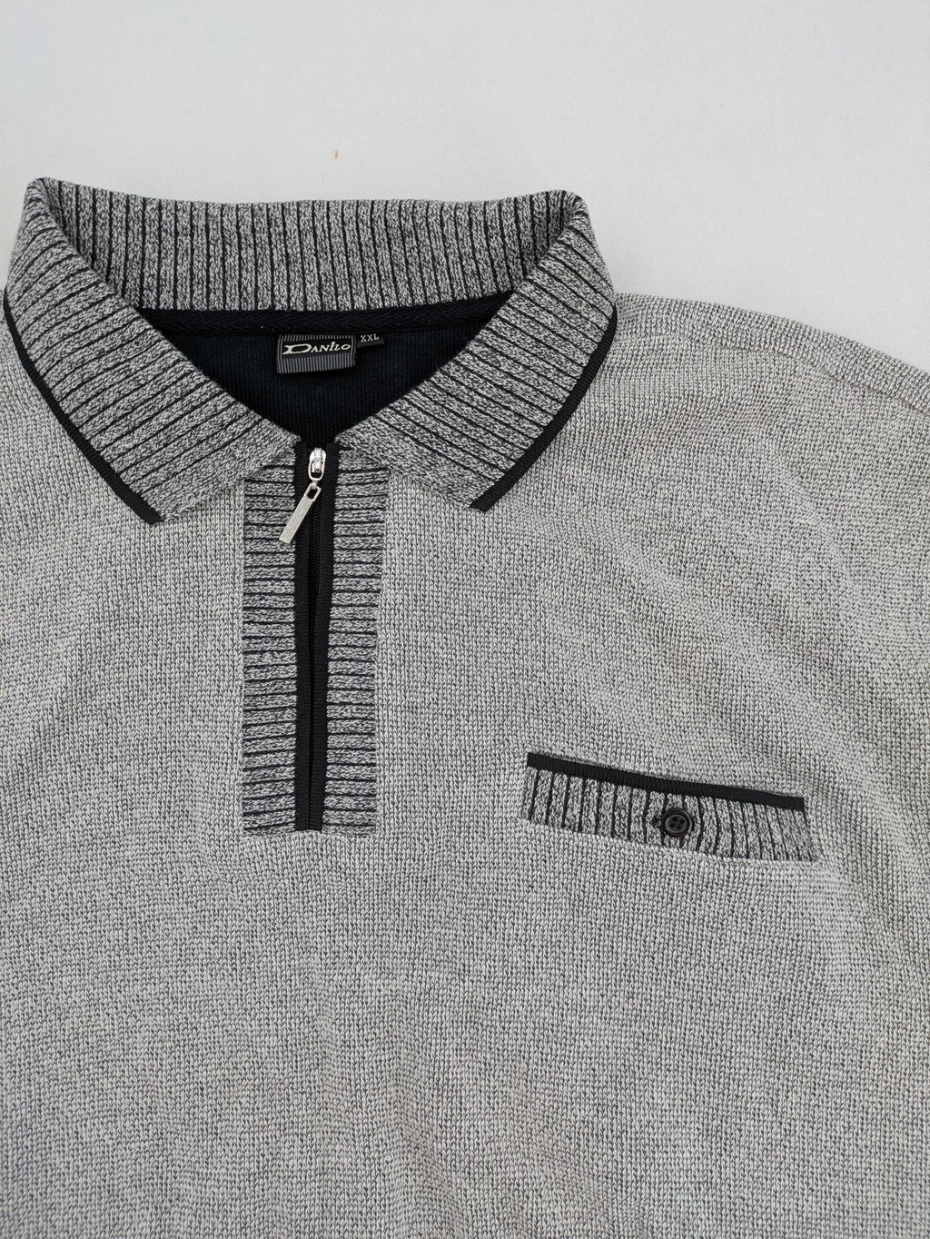 Danilo turtle neck jumper grey melange with black zipper and ribbed cuffs.