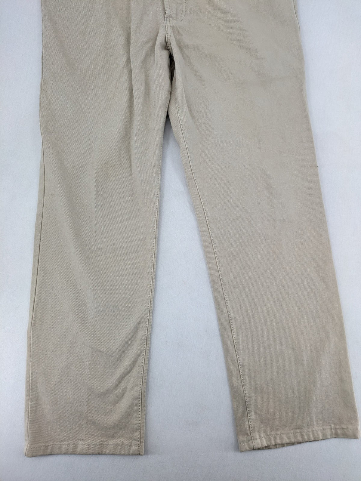 Joker beige straight jeans 5-pocket design with zipper and button closure.