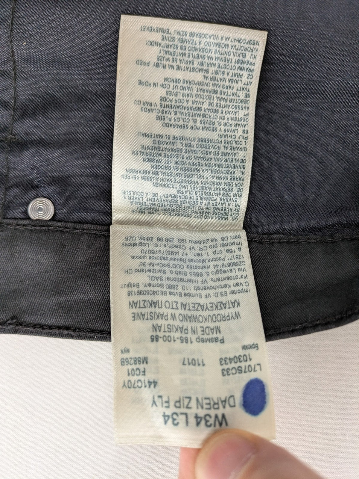 Lee straight jeans grey classic 5-pocket design with zip fly and subtle branding.