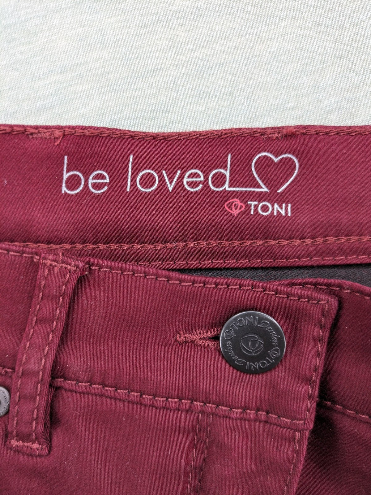 TONI burgundy straight jeans CS-Slim-Fit with subtle rhinestone detail on pocket.