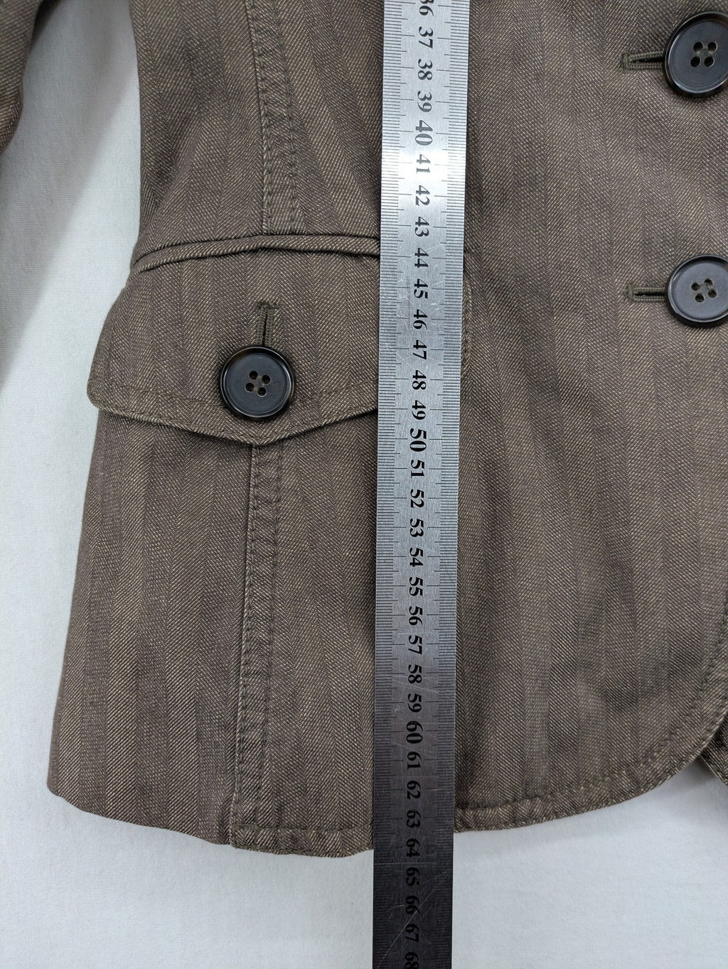 Esprit brown blazer jacket with three-button front and notch lapel, made of cotton.