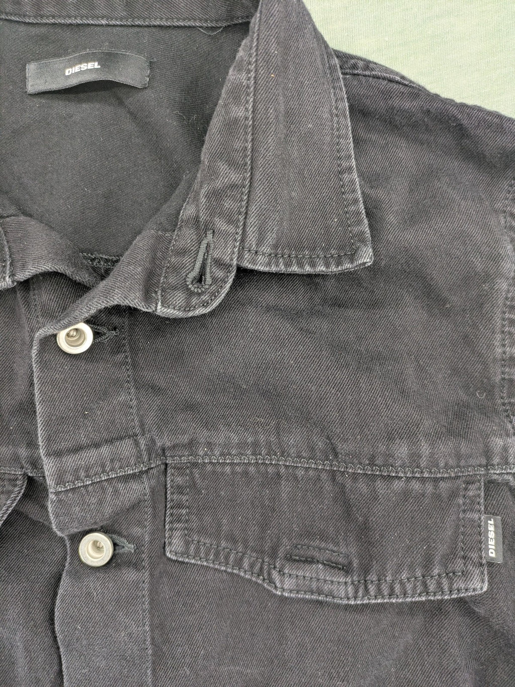 Diesel grey tunic top with denim front, pleated chiffon back, and D-ring detail.
