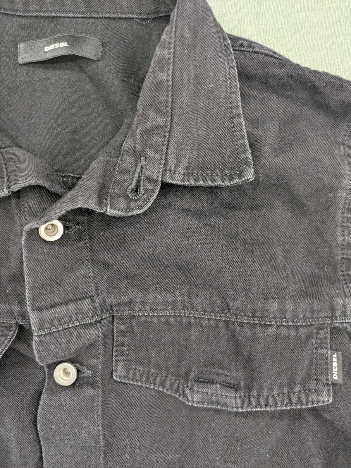 Diesel grey tunic top with denim front, pleated chiffon back, and D-ring detail.