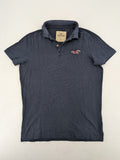 Hollister navy polo shirt with embroidered seagull logo and classic collar.