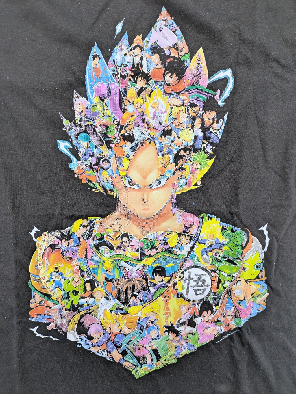 Dragon Ball Z grey t-shirt featuring Super Saiyajin Goku collage graphic design.