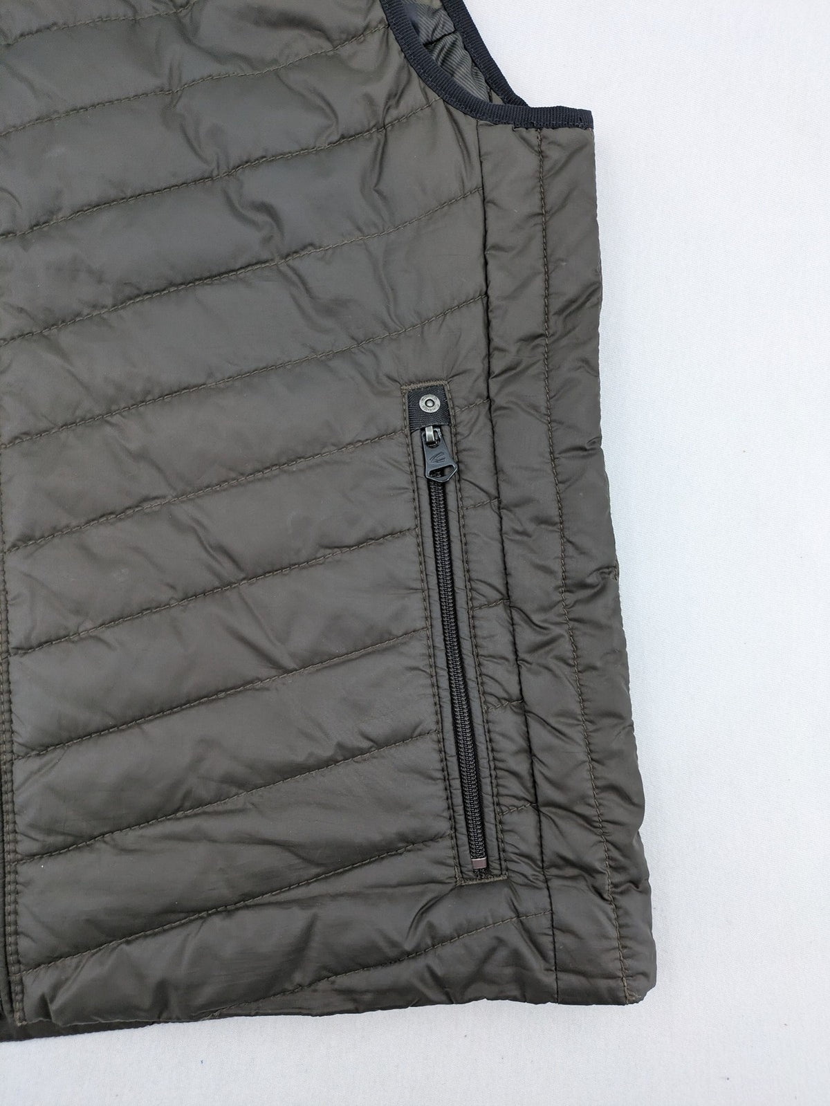 Camel Active khaki vest with full zip, quilted design, checkered lining, water-resistant.