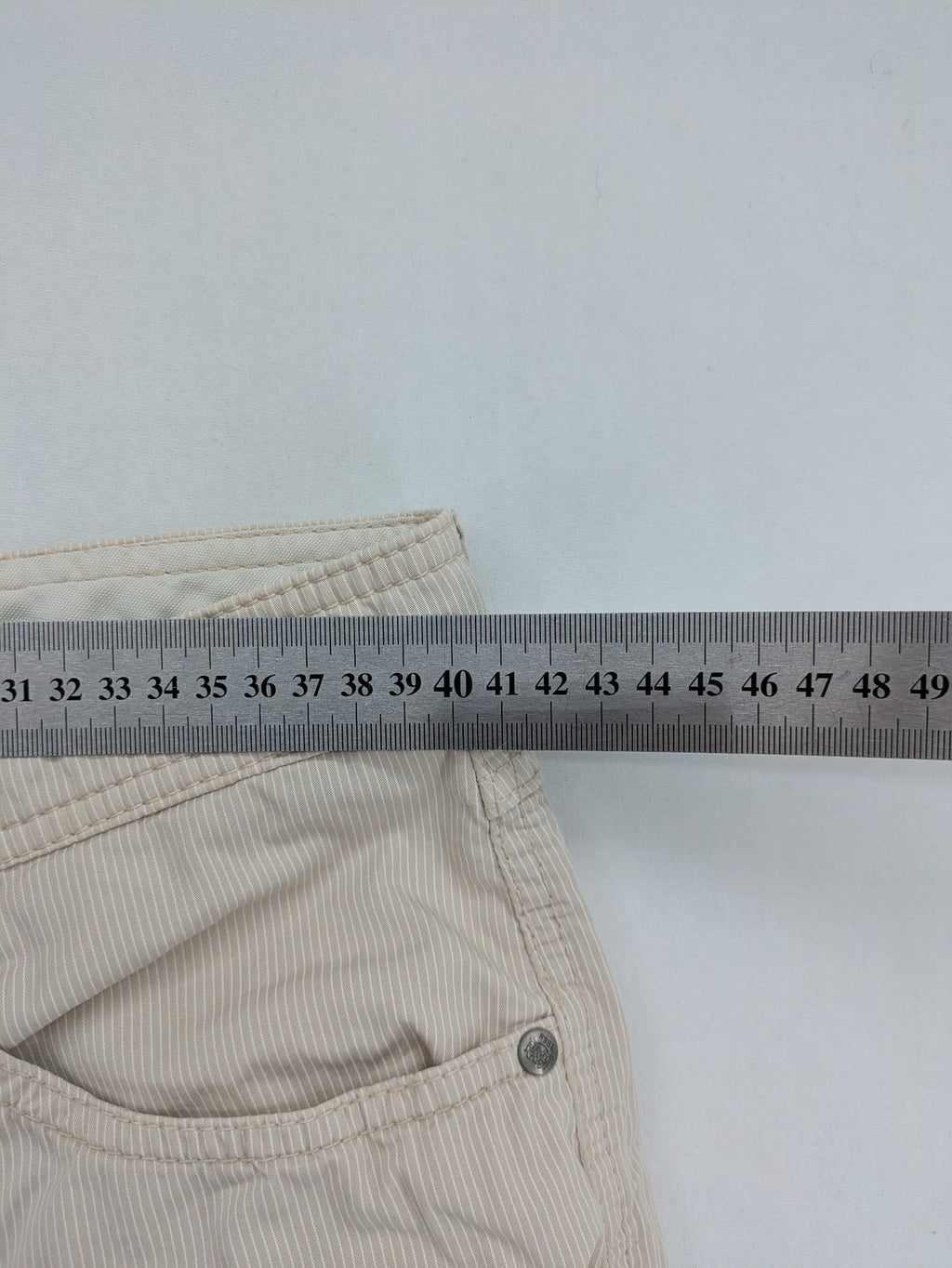 BRAX beige striped pants with logo, made from comfortable stretch cotton blend.