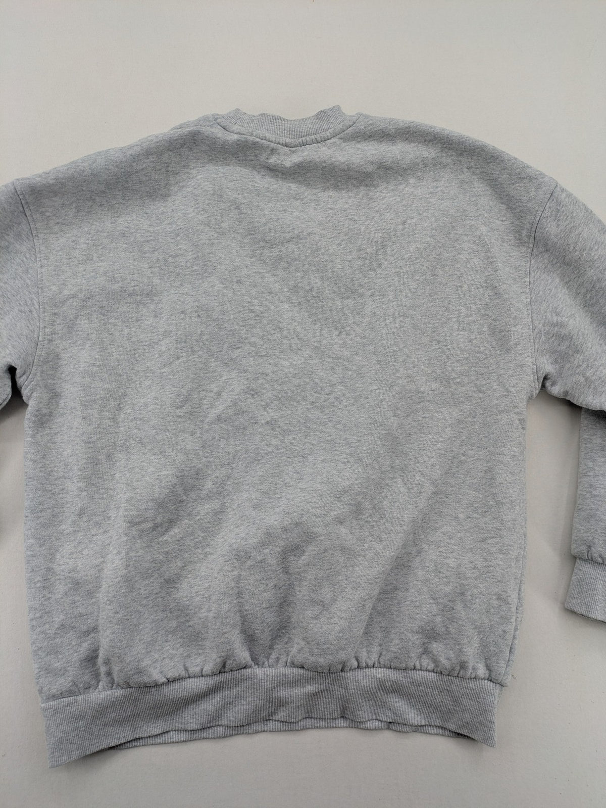 H&M Divided grey turtle neck jumper featuring Nirvana "In Utero" angel graphic.