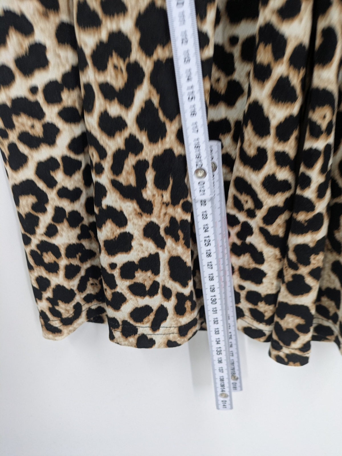 Amisu beige jumpsuit leopard print V-neck, short sleeves, keyhole back detail.