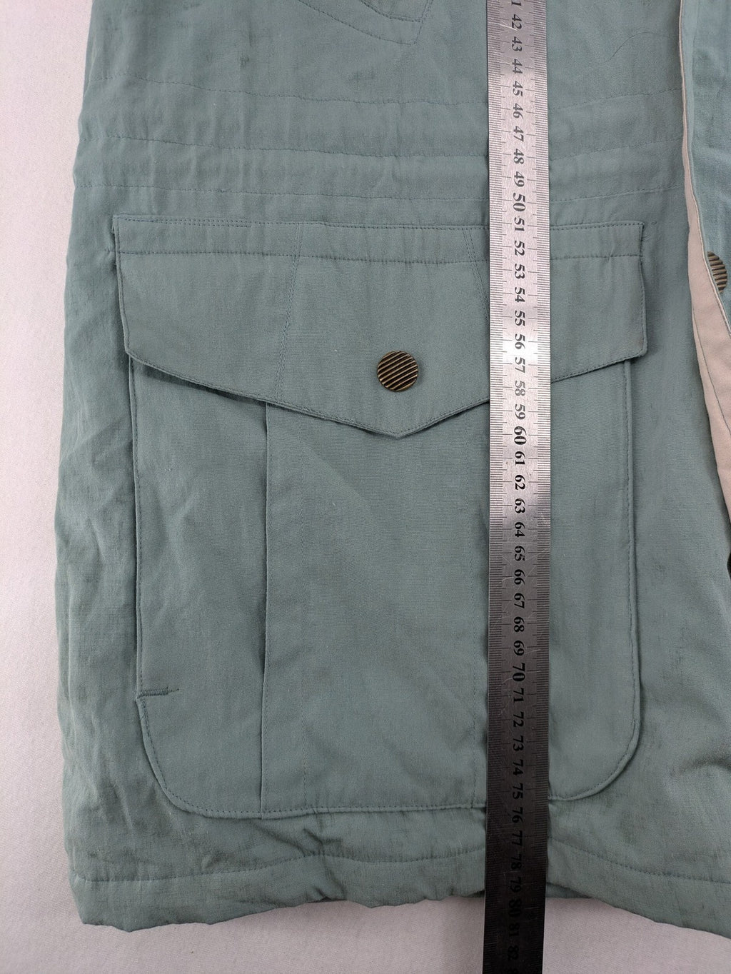 Klima green jacket vintage style, windproof, waterproof, with hidden hood and multiple pockets.