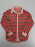 Amisu pink blouse with vibrant zigzag pattern and contrasting light pink collar and cuffs.