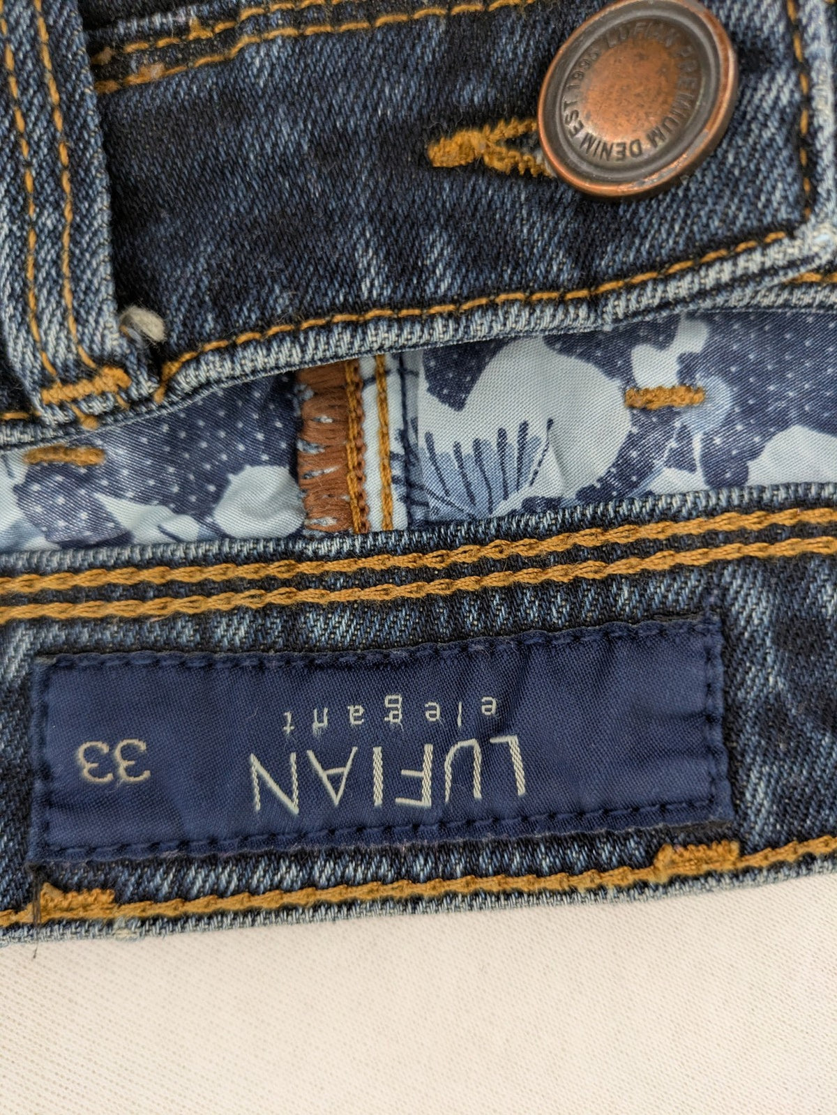Lufian blue straight jeans dark wash distressed 5-pocket style with stretch denim.