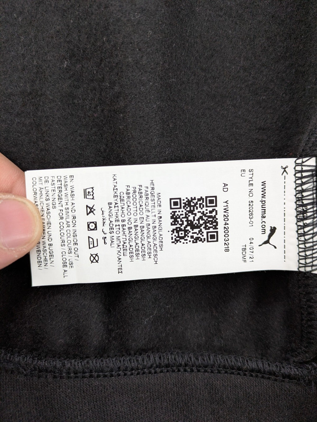 Puma grey zip-through hoodie with iconic logo and two practical pockets.