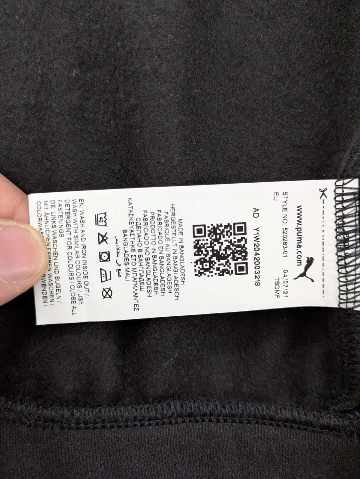 Puma grey zip-through hoodie with iconic logo and two practical pockets.