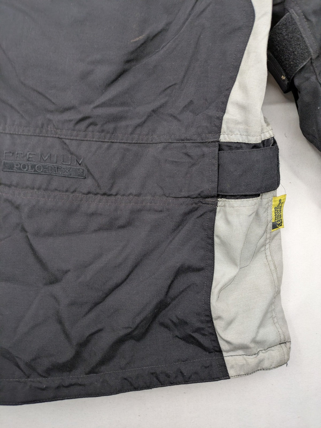 Polo motorcycle jacket cream durable Cordura fabric multiple pockets adjustable straps