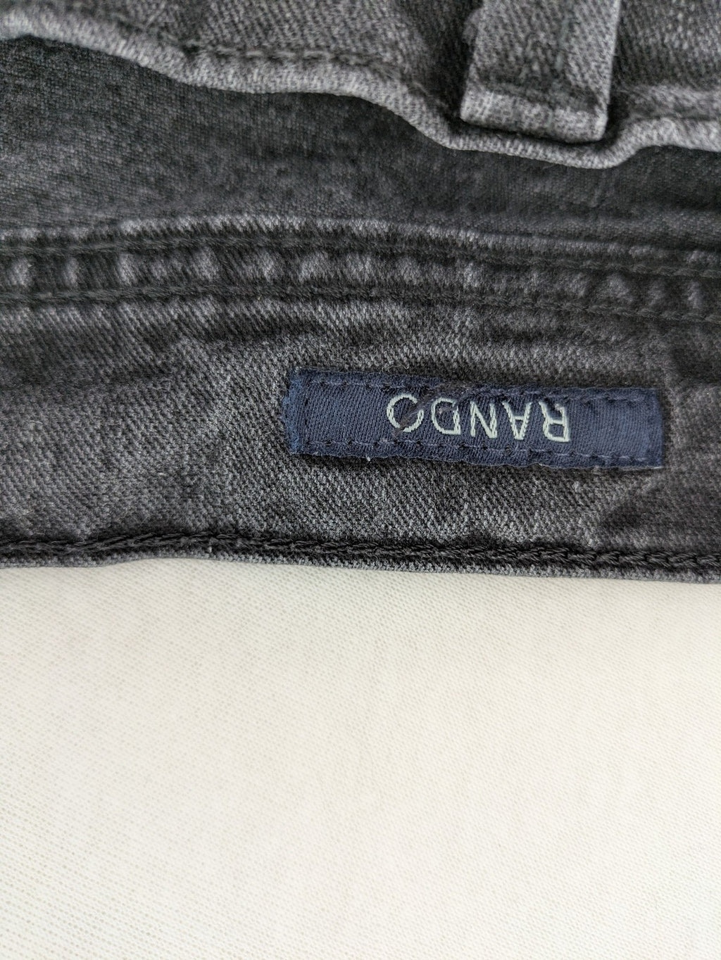 Pioneer grey straight jeans with washed finish and stretch material, classic design.