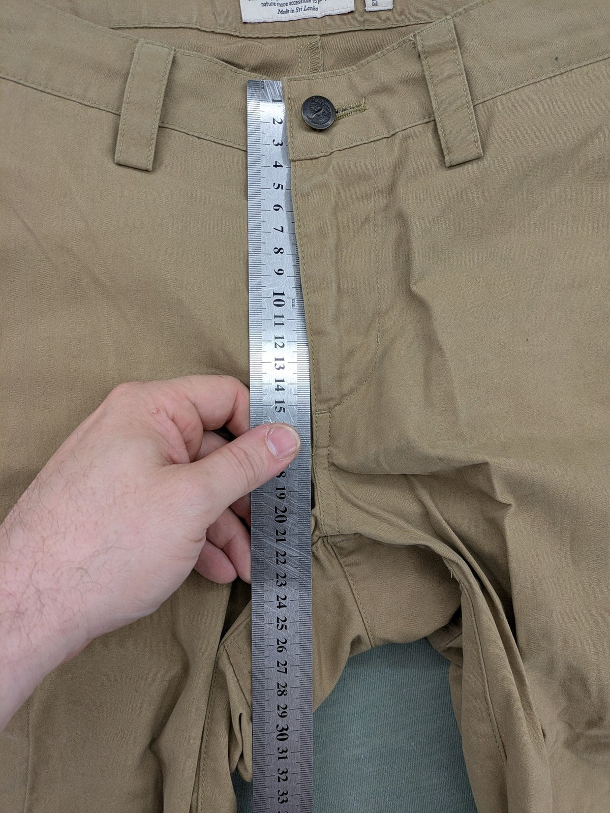 Fjällräven beige pants regular fit durable fabric outdoor style with logo detail.