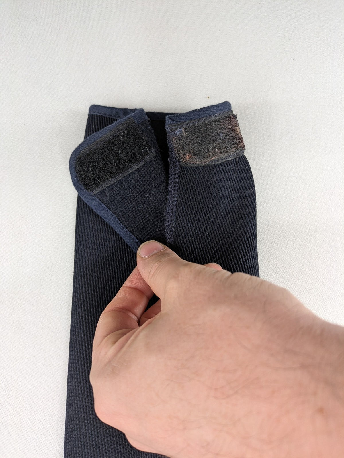 Cavalliero blue youth riding pants with knee patches and ribbed microfiber fabric.