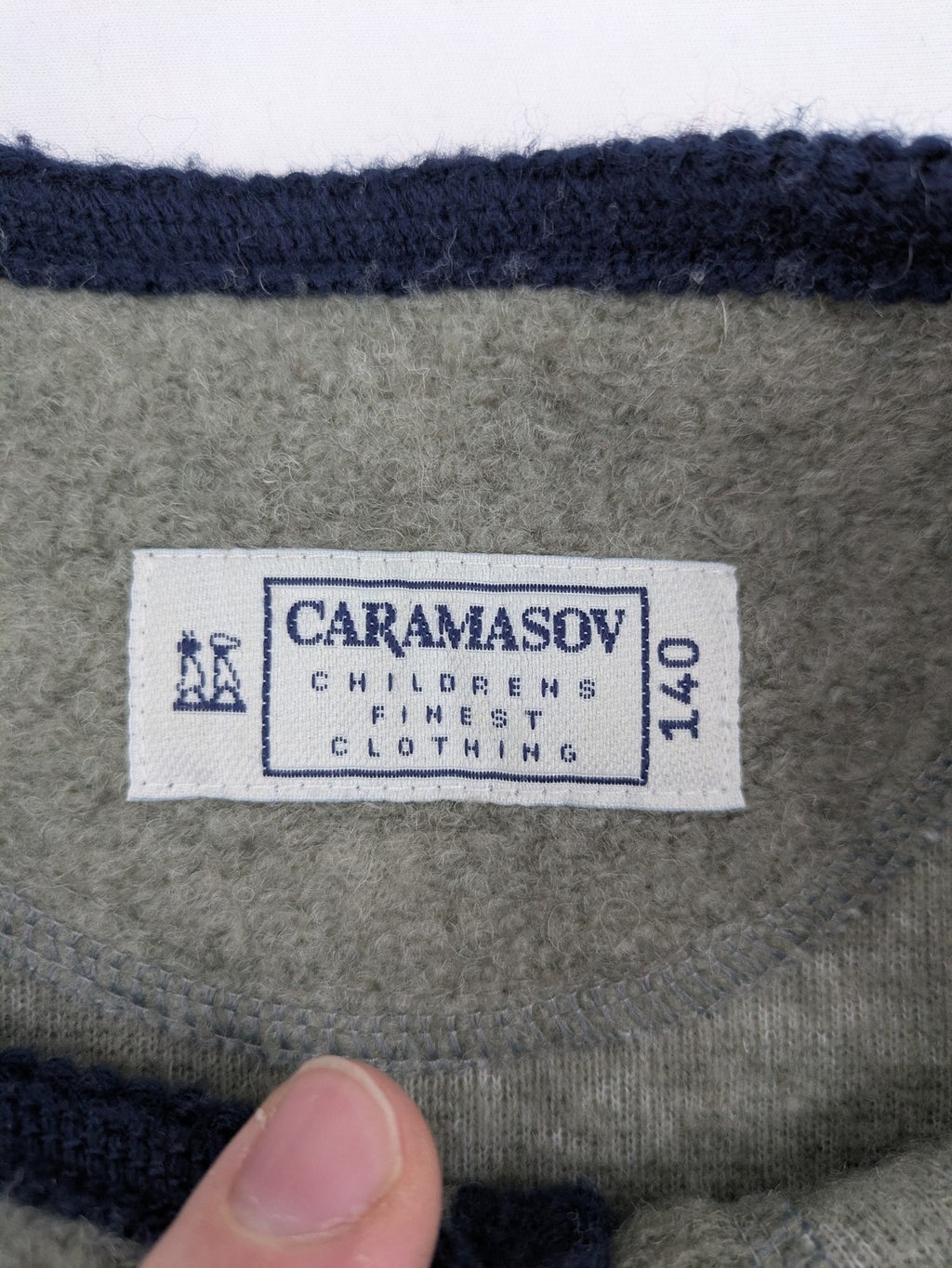 Caramasov grey and navy children's Janker jacket with contrasting trim and rustic buttons.