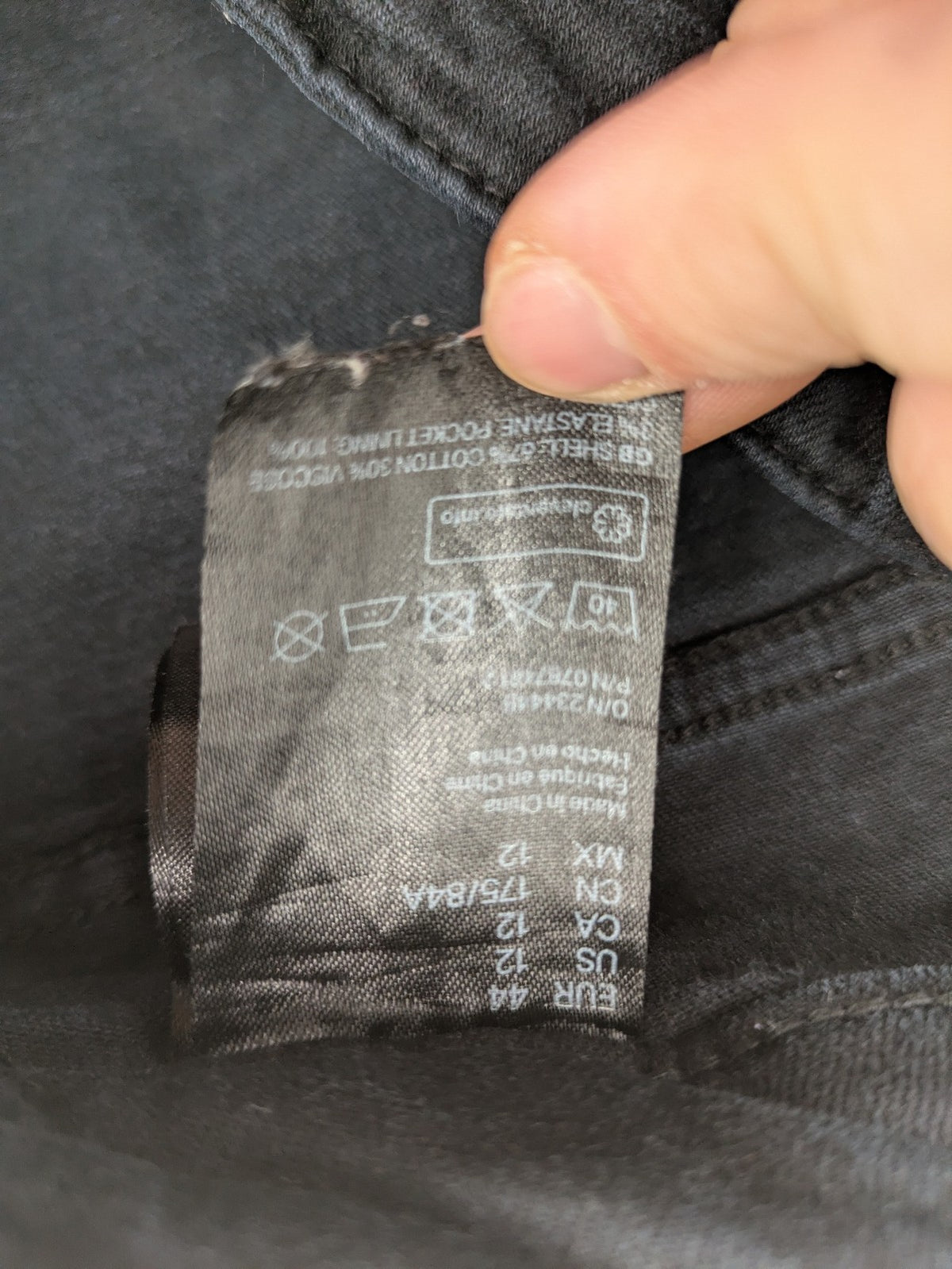 H&M grey skinny jeans with faded wash and soft stretch denim material.