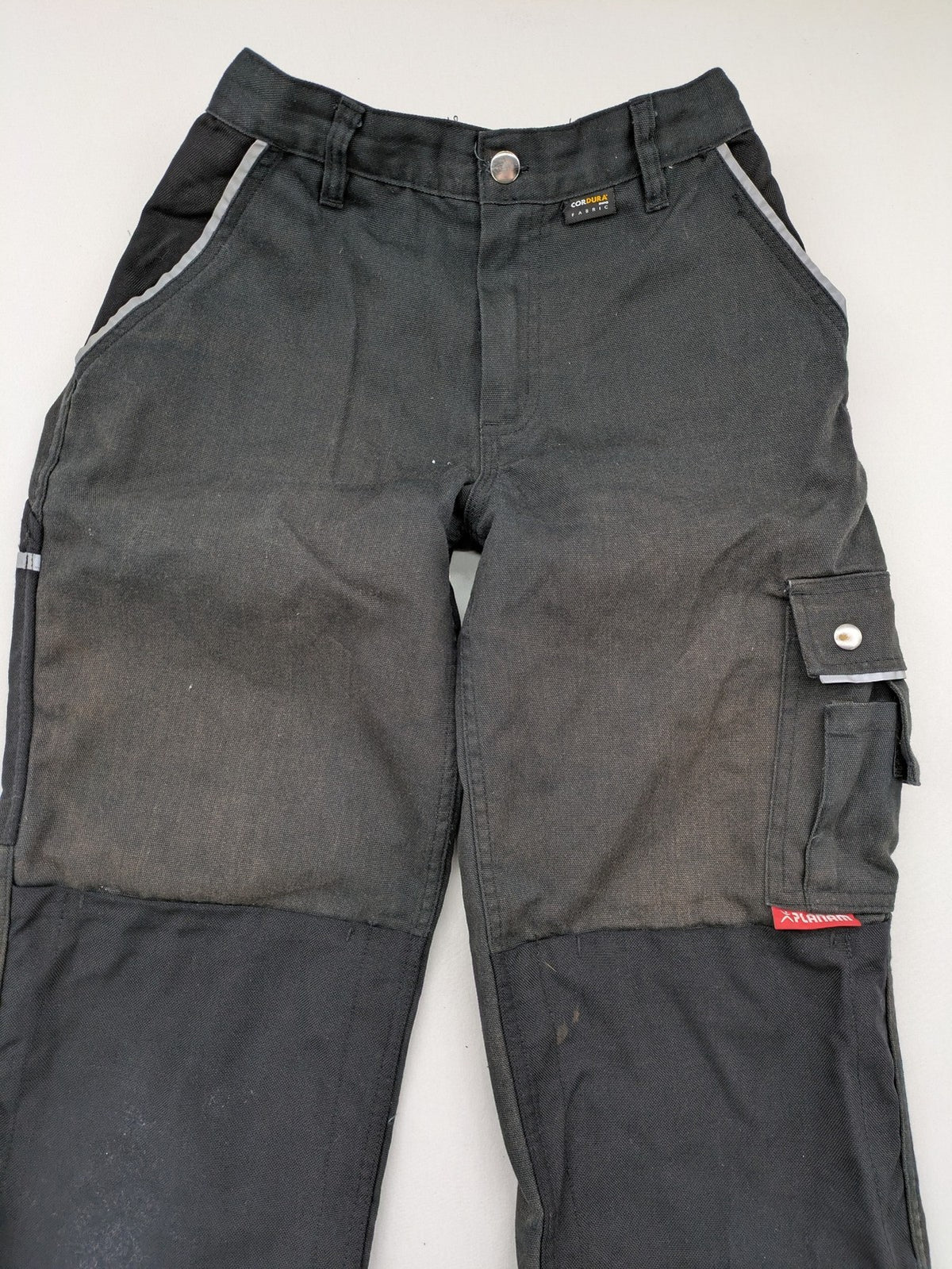 Planam work trousers black canvas with Cordura knee reinforcement and cargo pockets.