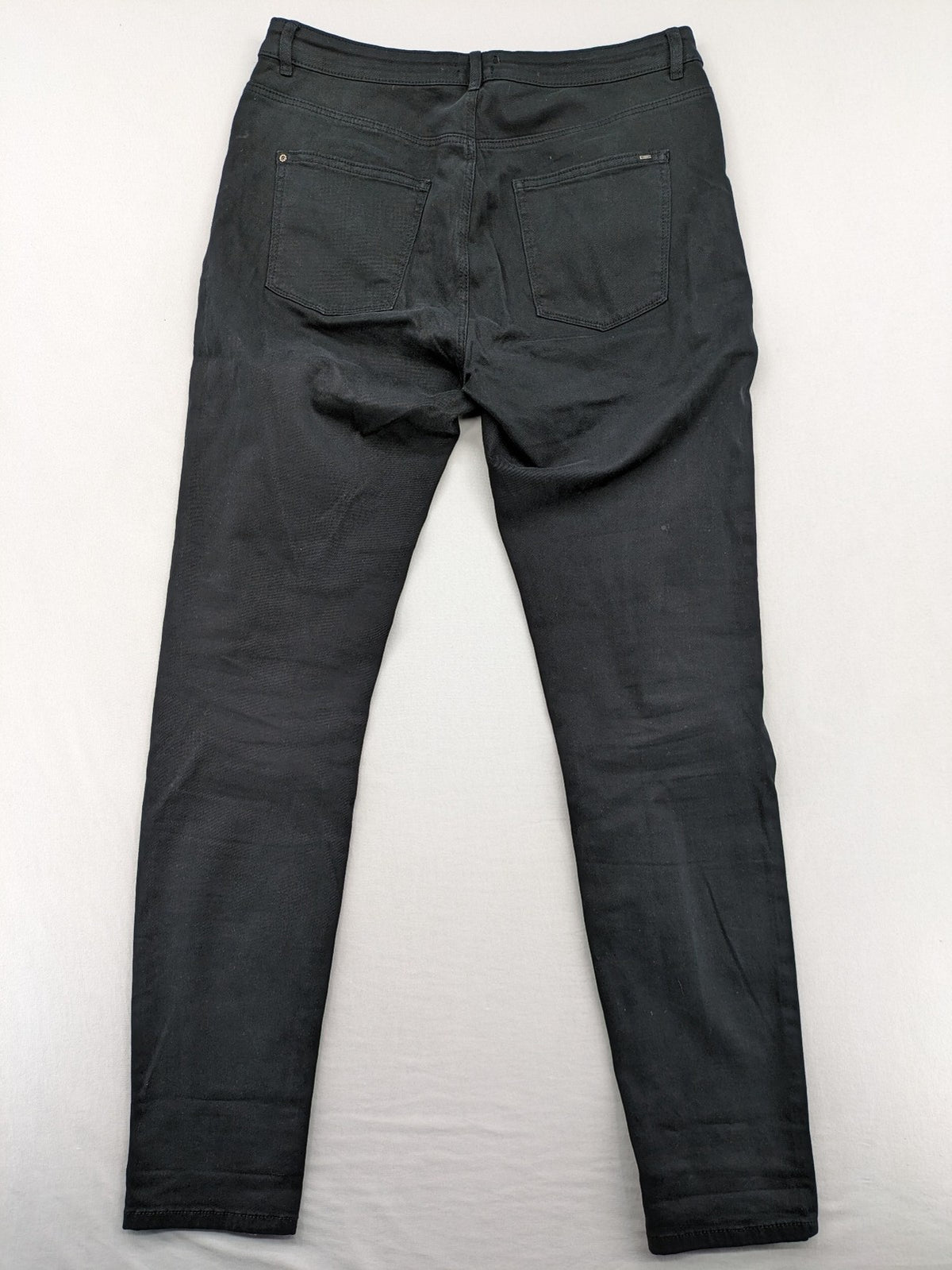 Esprit black skinny jeans with zipper details and cotton-stretch material.