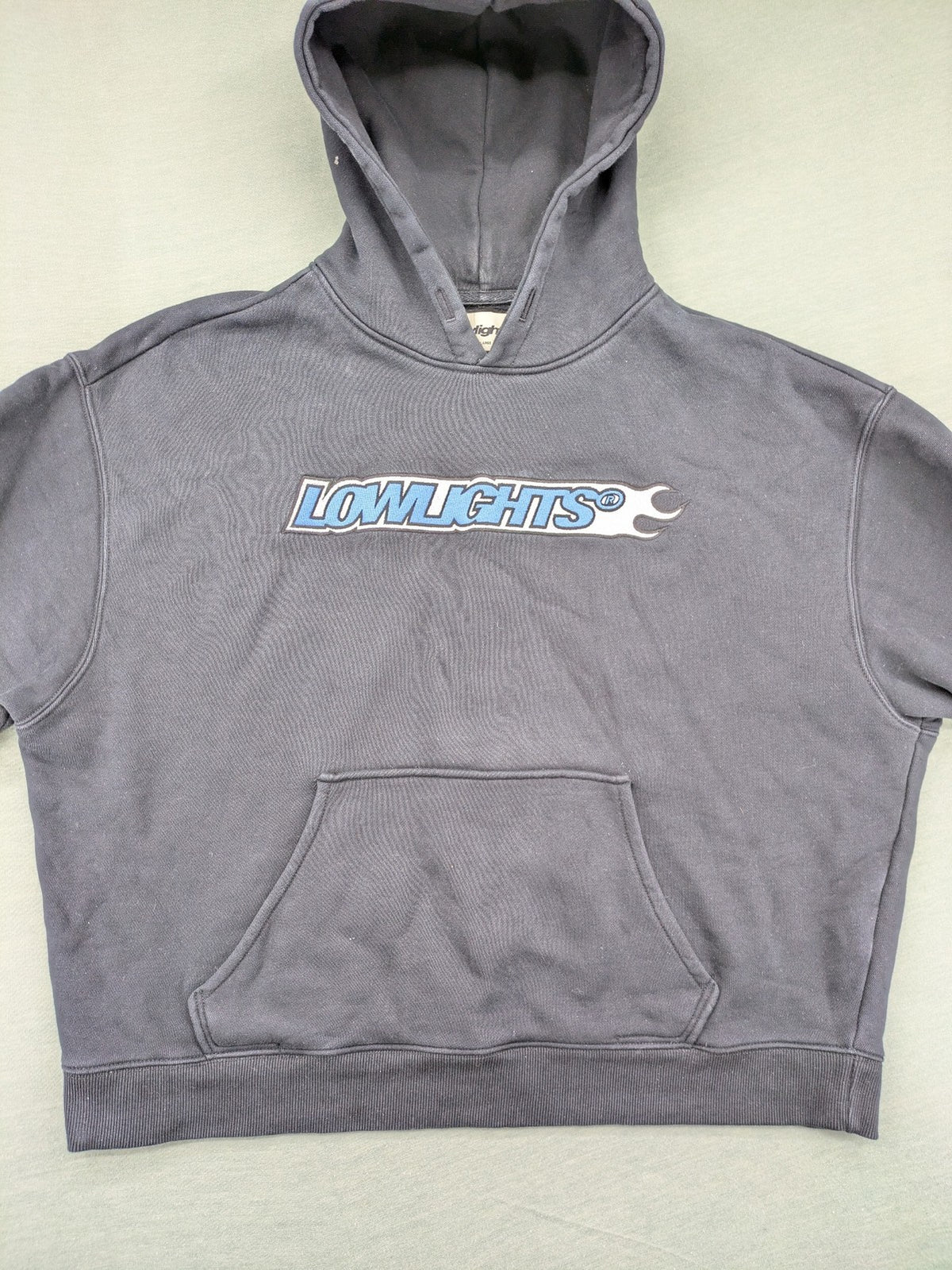 Lowlights Studios grey hoodie with embroidered logo and kangaroo pocket, 100% cotton.